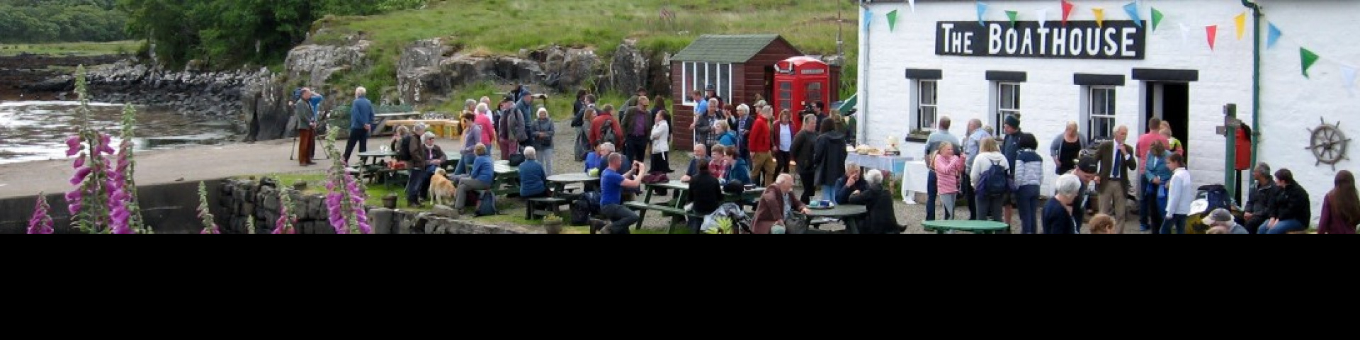 Members of the local community celebrating the successful buyout of Ulva.