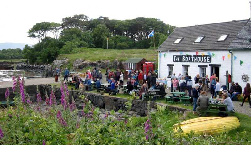 Members of the local community celebrating the successful buyout of Ulva.