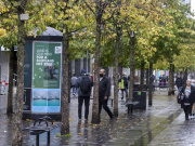 Land is Our Hero for a Scotland Net Zero poster in place on Sauchiehall Street