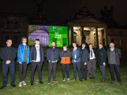 Students from the winning team from Kemnay Academy pose in front of their film projected onto the Scottish National Gallery of Modern Art building with Chair Andrew Thin (left), Land Commissioner Lorne MacLeod (right), and Calum Maclean (centre.) Credit: Adam Kenrick.
