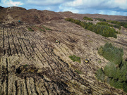 Aerial view of diggers working on land owned by the Sleat Community Trust, Skye. Credit: SCT.